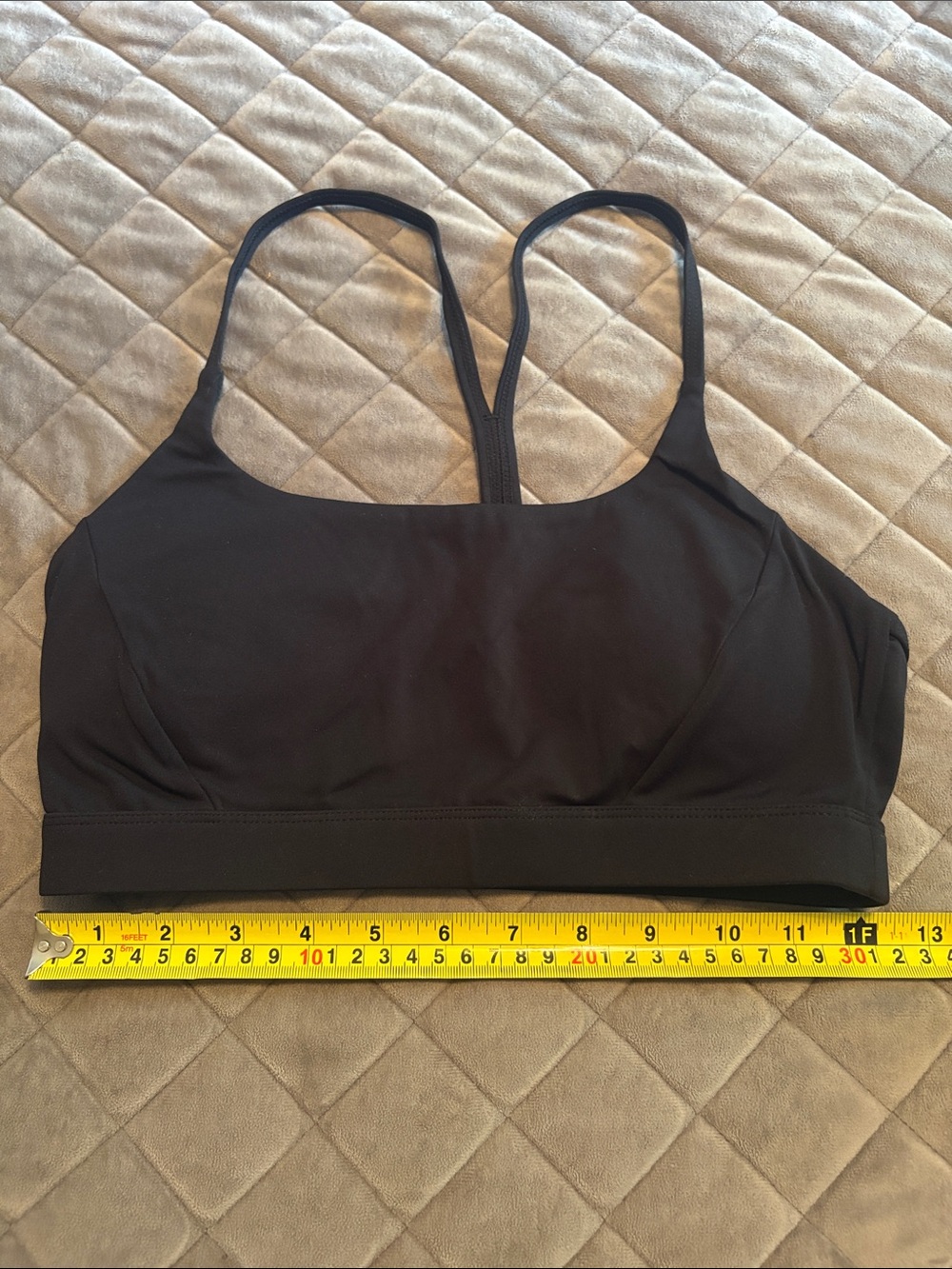 Running Girl black racerback sports bra. Small